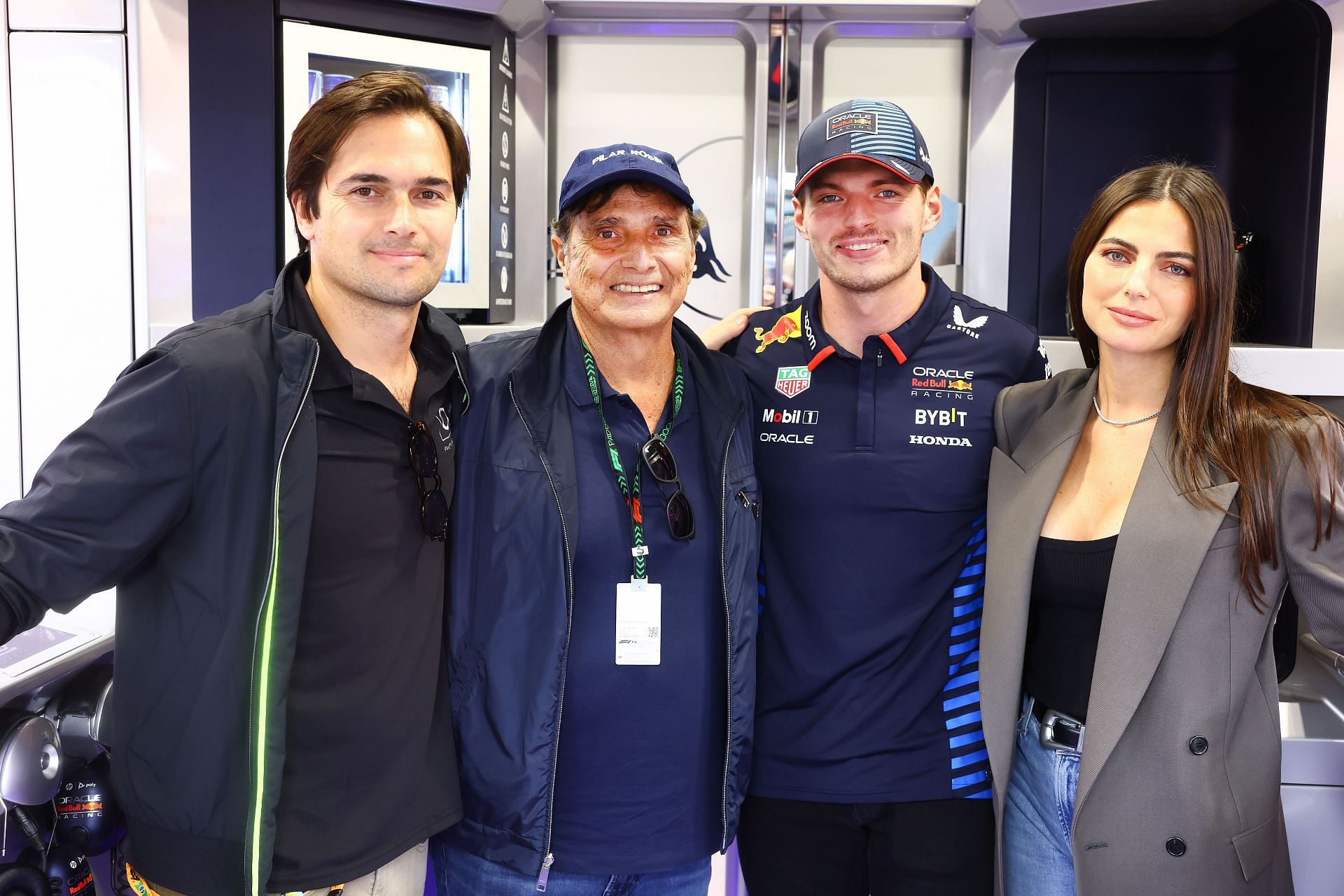 Nelson Piquet Jr, Nelson Piquet, Max Verstappen of the Netherlands and Oracle Red Bull Racing, and Kelly Piquet pose for a photo - Source: Getty